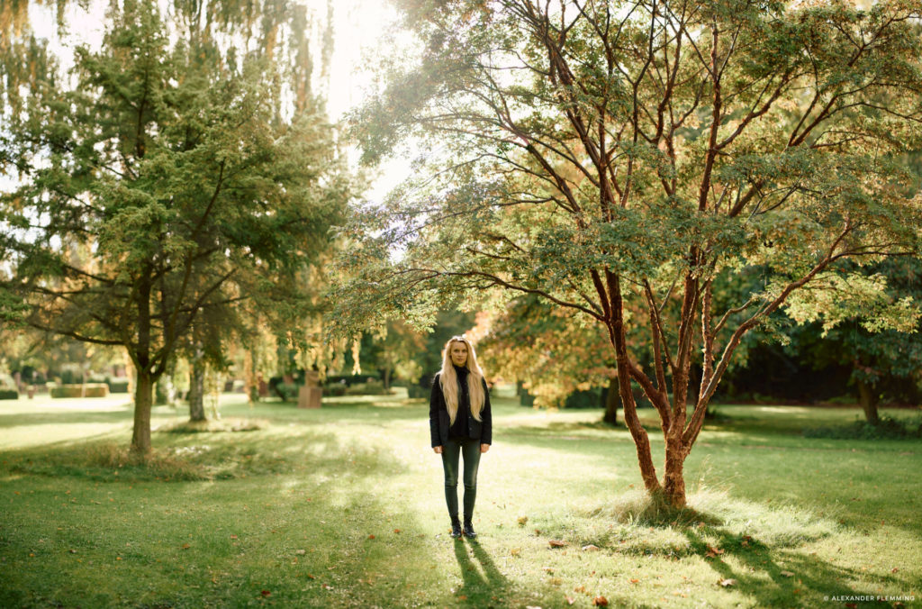 Final image using panoramic stitch. Girl in a field