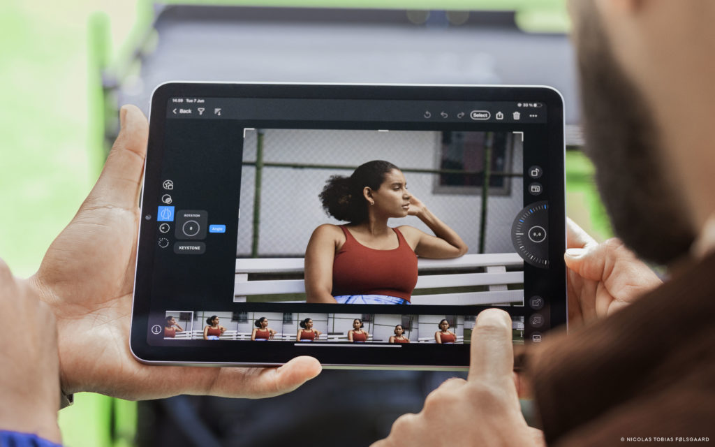 Photographer and art director evaluating images on location through Capture One for iPad